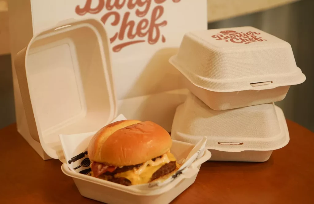 Eco-friendly compostable burger boxes, made of sugarcane pulp, takeout food packaging