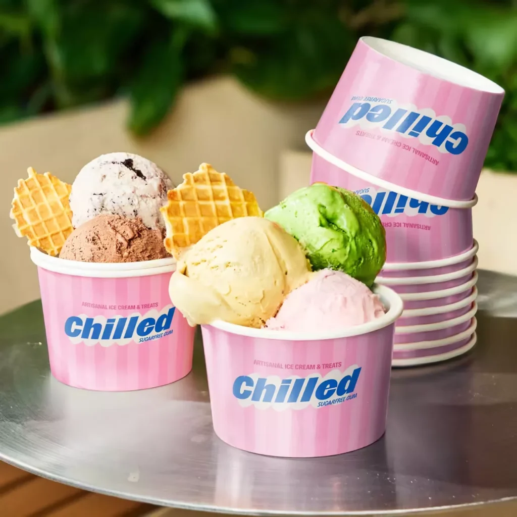 Pink striped custom ice cream cups for small businesses, disposable paper cups, bulk wholesale packaging for artisanal ice cream treats