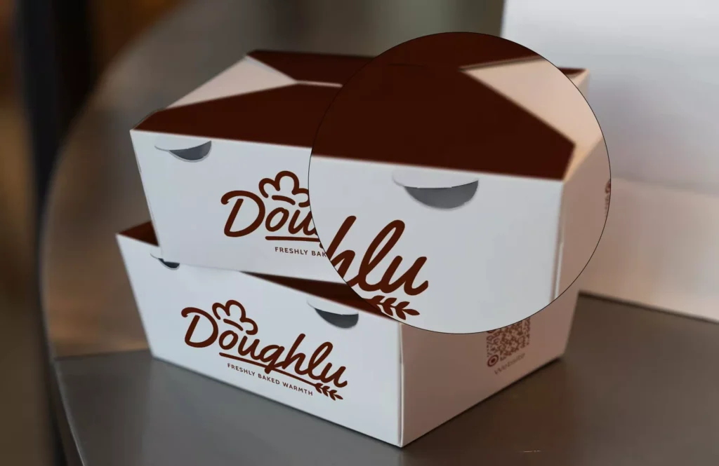 Air vent cutouts on pastry takeout box to prevent soggy packaging during delivery transit