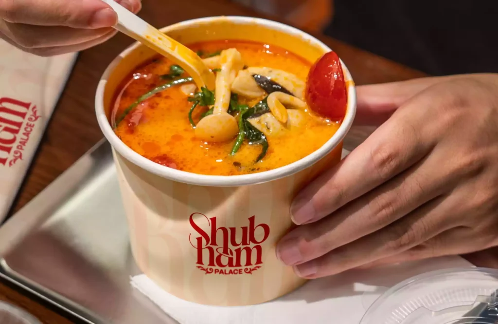 Takeout Soup Containers custom printed paper cup holding tom yum takeout soup